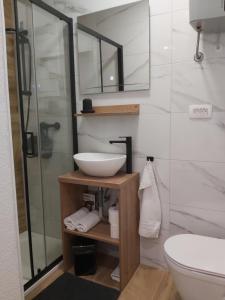 Ванная комната в Studio apartman Oliva