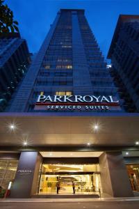 a large building with a sign on the side of it at PARKROYAL Serviced Suites Kuala Lumpur in Kuala Lumpur