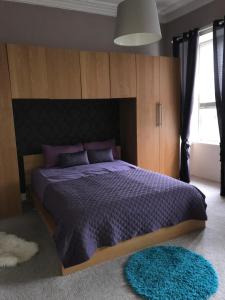 Posteľ alebo postele v izbe v ubytovaní Apex Buccleuch Street Apartment