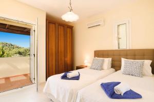 Postel nebo postele na pokoji v ubytování Villa Athena Springs by Villa Plus + 9 fotografií