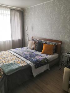 Posteľ alebo postele v izbe v ubytovaní Аренда квартиры город Рудный