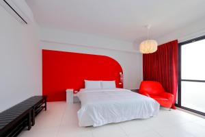 Een bed of bedden in een kamer bij 自在緣精品民宿