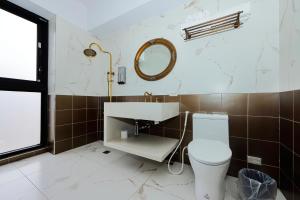 Een badkamer bij 自在緣精品民宿