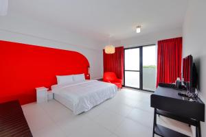 Een bed of bedden in een kamer bij 自在緣精品民宿