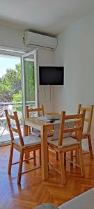TV a/nebo společenská místnost v ubytování Adriatic Blue View