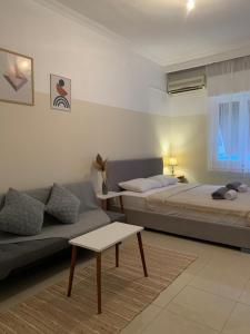 Posteľ alebo postele v izbe v ubytovaní Iviskos living spot