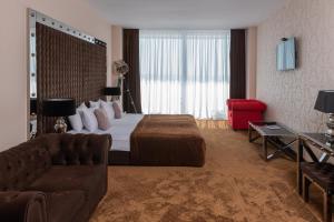 Кровать или кровати в номере Marine Residence Sea View