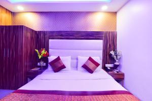 Postel nebo postele na pokoji v ubytování Olivia Hotels At Delhi Airport