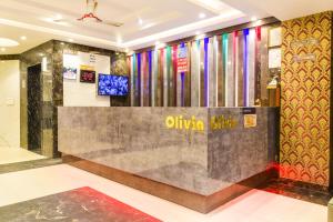 TV a/nebo společenská místnost v ubytování Olivia Hotels At Delhi Airport