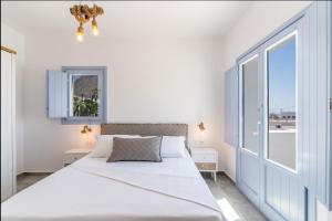 SantoRossa Luxury Villas客房内的一张或多张床位