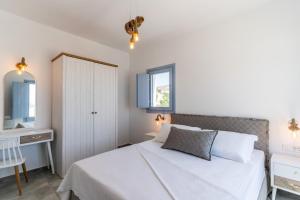 SantoRossa Luxury Villas客房内的一张或多张床位