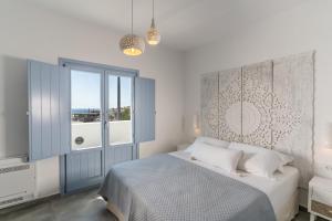 SantoRossa Luxury Villas客房内的一张或多张床位