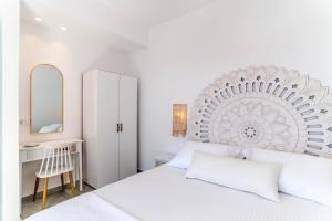 SantoRossa Luxury Villas客房内的一张或多张床位