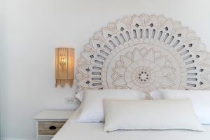 SantoRossa Luxury Villas客房内的一张或多张床位