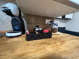 A kitchen or kitchenette at Grazioso Appartamento a 10 min da MXP