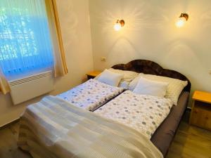Posteľ alebo postele v izbe v ubytovaní Cili's Apartments Vonyarcvashegy Balaton