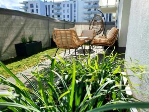 Vonkajšia záhrada v ubytovaní Apartament nad Iławką