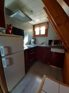 Kuchyň nebo kuchyňský kout v ubytování chalets cocody