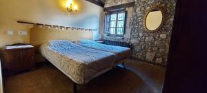 Cama o camas de una habitación en Castell de Llaés