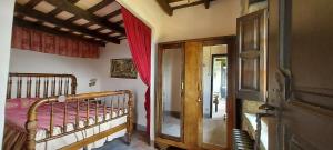 Cama o camas de una habitación en Castell de Llaés