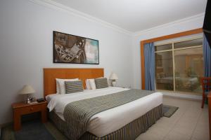 Voodi või voodid majutusasutuse Atana Khasab Hotel toas