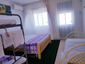 Postel nebo postele na pokoji v ubytování ROOMS fronte lago