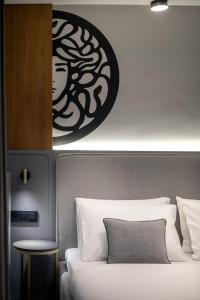 Posteľ alebo postele v izbe v ubytovaní Art Boutique