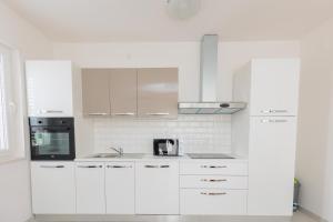 Kuchnia lub aneks kuchenny w obiekcie Buena Vida Apartman