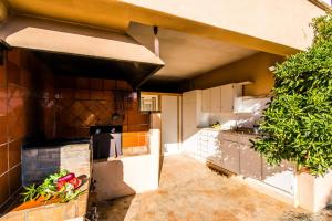 A kitchen or kitchenette at Can Rafelino, pool and relax