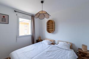 Postel nebo postele na pokoji v ubytování Mari - Appt tout confort 150m de la plage