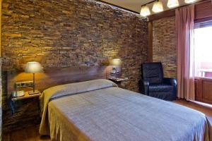 Postel nebo postele na pokoji v ubytování Hotel Doña Blanca