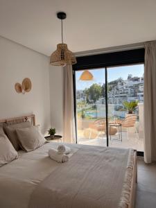 Posteľ alebo postele v izbe v ubytovaní Tropical penthouse with big roof terrace + 37 fotografií