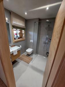 Kúpeľňa v ubytovaní Ca' Fam Chalets + 37 fotografií