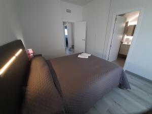 A bed or beds in a room at África View
