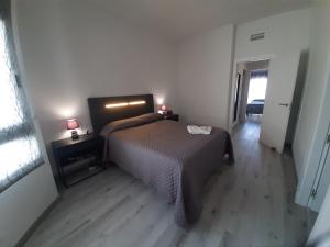 A bed or beds in a room at África View