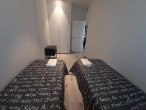 A bed or beds in a room at África View