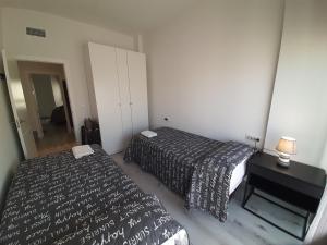 A bed or beds in a room at África View