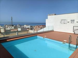 The swimming pool at or close to África View