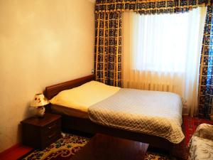 Postel nebo postele na pokoji v ubytování Baktygul guesthouse