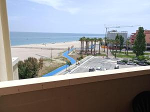 a view of the beach from the balcony of a condo at Skyscraper Porto Sant'Elpidio in Porto SantʼElpidio