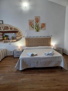 Katil atau katil-katil dalam bilik di B&B Bedda Ista
