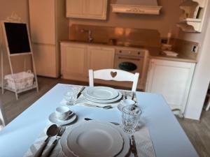 A kitchen or kitchenette at La Perla del Borgo B&B