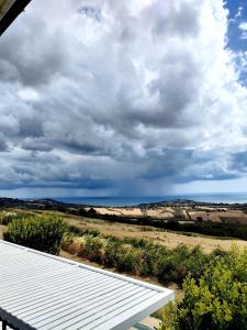 a view of the ocean from the roof of a house at Villa Polercia in Cupello