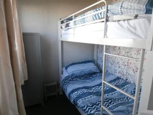 a bunk bed room with two bunk beds and a mattress at Lovely 2-Bed Chalet in Mablethorpe in Mablethorpe