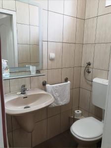 Vannituba majutusasutuses ATRIJUM apartmani Apatin +26 fotot