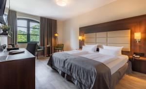 Postel nebo postele na pokoji v ubytování Hotel Ohlenhoff