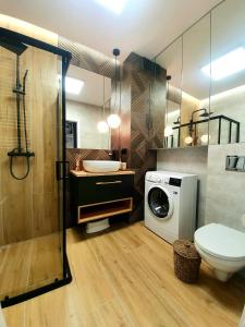 Kúpeľňa v ubytovaní Apartament nad Iławką + 17 fotografií