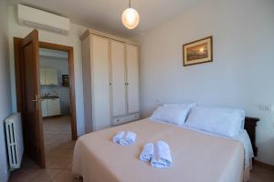 Posteľ alebo postele v izbe v ubytovaní Poggio delle Rose Tuscany Relais