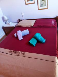 A bed or beds in a room at Irene's loft