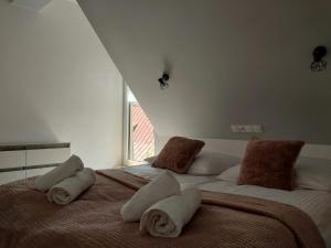 Posteľ alebo postele v izbe v ubytovaní Apartament okno na Giewont
